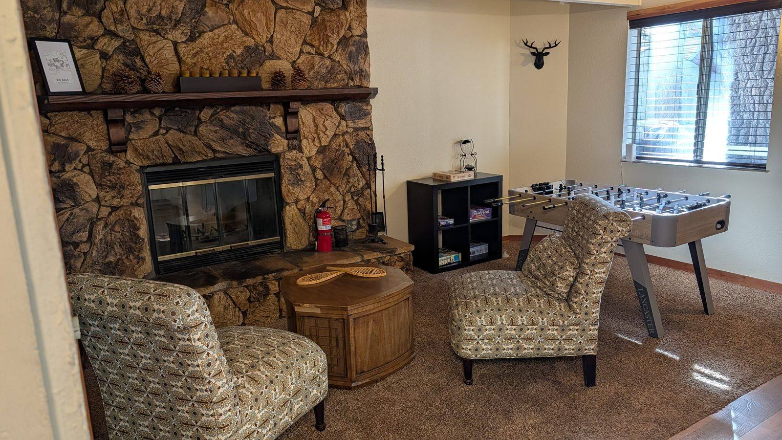 Stone fireplace and game room
